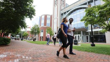 Two students walk together